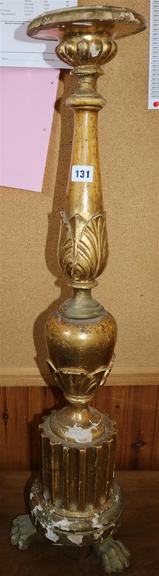 Carved giltwood torchere (a.f.)